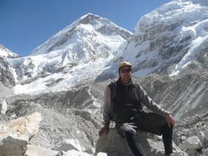 Jerry near Everest Base Camp, with the Khumbu Ice Fall tumbling down behind