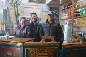 The friendly lodgekeepers of the Kamal Lodge in Namche Bazaar . . . Kamal, on the right is the father with his son and daughter-in-law                 